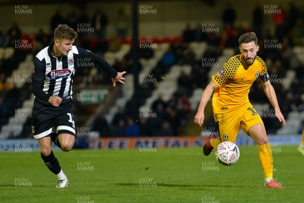 091119 - Grimsby Town v Newport County - FA Cup First Round -  Josh Sheehan in action against Ethan Robson