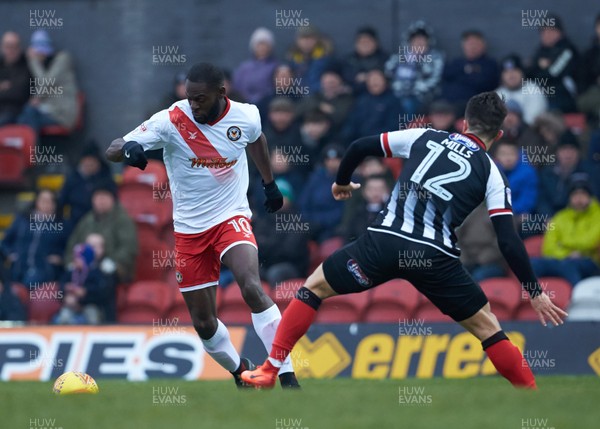 130118 - Grimsby Town v Newport County - Sky Bet League Two -  Newport's Frank Nouble beats Grimsby's Zak Mills