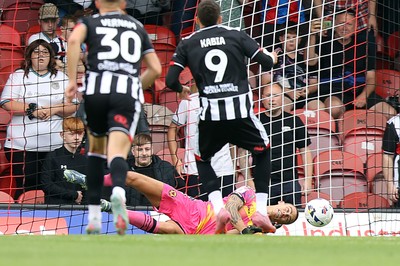 160825 - Grimsby Town v Newport County - Sky Bet League 2 - Goalkeeper Nik Tzanev of Newport saves a penalty from Jaze Kabia of Grimsby Town in 1st half