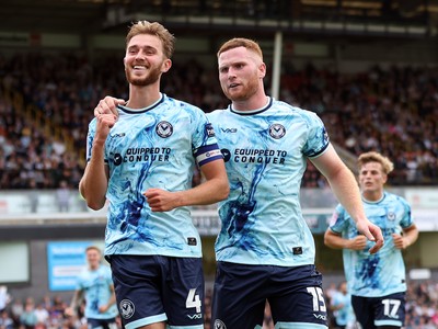 160825 - Grimsby Town v Newport County - Sky Bet League 2 - Matt Baker of Newport celebrates after scoring equaliser with Lee Jenkins of Newport