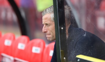 160825 - Grimsby Town v Newport County - Sky Bet League 2 - Newport caretaker manager David Hughesin Away Dugout before match