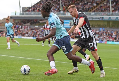 160825 - Grimsby Town v Newport County - Sky Bet League 2 -Michael Reindorf of Newport and Cameron McJannet of Grimsby Town