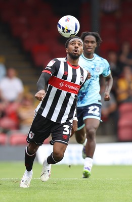 160825 - Grimsby Town v Newport County - Sky Bet League 2 - Habeeb Ogunneye of Newport and Jayden Sweeney of Grimsby Town