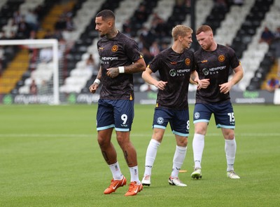 160825 - Grimsby Town v Newport County - Sky Bet League 2 - Warm up Courtney Baker-Richardson of Newport Lee Jenkins of Newport and Matthew Smith of Newport