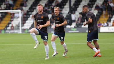160825 - Grimsby Town v Newport County - Sky Bet League 2 - Warm up Courtney Baker-Richardson of Newport and Lee Jenkins of Newport and Matthew Smith of Newport