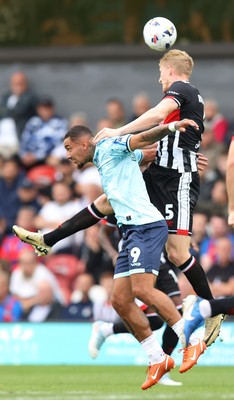 160825 - Grimsby Town v Newport County - Sky Bet League 2 - Courtney Baker-Richardson of Newport and Harvey Rodgers of Grimsby Town