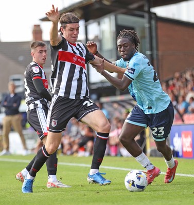 160825 - Grimsby Town v Newport County - Sky Bet League 2 - Michael Reindorf of Newport and Doug Tharme of Grimsby Town