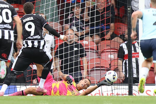 160825 - Grimsby Town v Newport County - Sky Bet League 2 - Goalkeeper Nik Tzanev of Newport saves a penalty from Jaze Kabia of Grimsby Town in 1st half