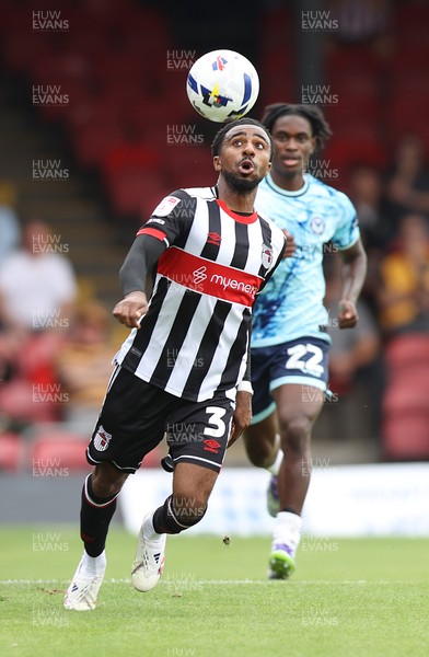 160825 - Grimsby Town v Newport County - Sky Bet League 2 - Habeeb Ogunneye of Newport and Jayden Sweeney of Grimsby Town