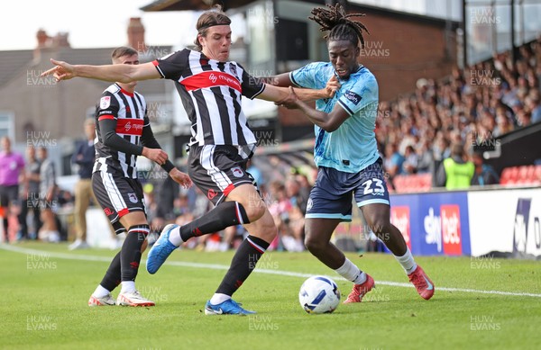 160825 - Grimsby Town v Newport County - Sky Bet League 2 - Michael Reindorf of Newport and Doug Tharme of Grimsby Town