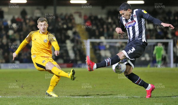 250220 - Grimsby Town v Newport County - Sky Bet League 2 - Otis Khan of Newport passes the ball through the legs of Bradley Garmston of Grimsby Town
