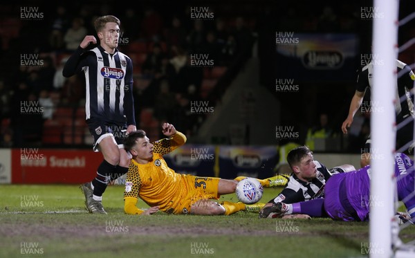 250220 - Grimsby Town v Newport County - Sky Bet League 2 - Scramble in the goalmouth for Otis Khan of Newport County