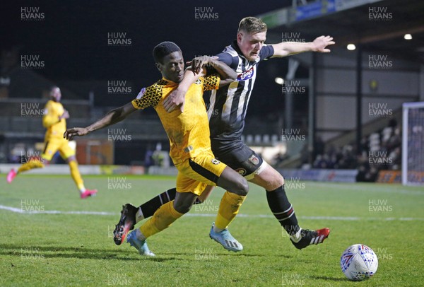 250220 - Grimsby Town v Newport County - Sky Bet League 2 - Mattie Pollock of Grimsby Town and Jordan Green of Newport County