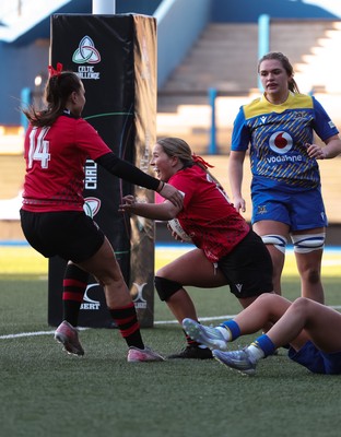271225 - Gwalia Lightning v Brython Thunder, Celtic Challenge - Gabby Healen of Brython Thunder celebrates with Amelia Tutt of Brython Thunder after she races in to score try