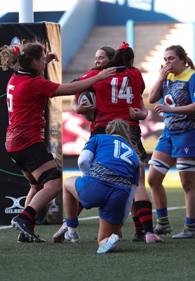 271225 - Gwalia Lightning v Brython Thunder, Celtic Challenge - Gabby Healen of Brython Thunder celebrates with Amelia Tutt and Natalia John of Brython Thunder after she races in to score try