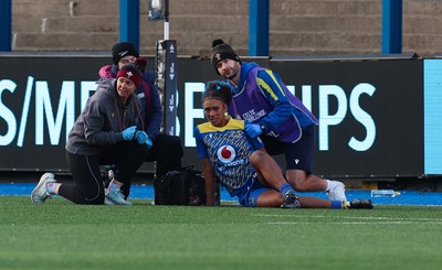 271225 - Gwalia Lightning v Brython Thunder, Celtic Challenge - Nia Fajeyisan of Gwalia Lightning is treated after being injured before leaving the pitch on a stretcher 