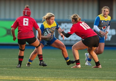 271225 - Gwalia Lightning v Brython Thunder, Celtic Challenge - Molly Reardon of Gwalia Lightning takes on Ffion Williams of Brython Thunder and Finley Jones of Brython Thunder