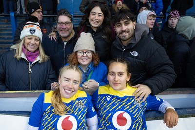 271225 - Gwalia Lightning v Brython Thunder, Celtic Challenge - Catherine Richards of Gwalia Lightning and Carys Hughes of Gwalia Lightning with family and friends at the end of the match