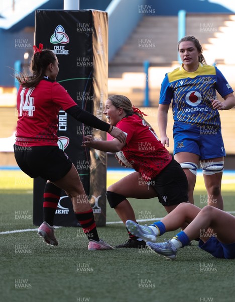 271225 - Gwalia Lightning v Brython Thunder, Celtic Challenge - Gabby Healen of Brython Thunder celebrates with Amelia Tutt of Brython Thunder after she races in to score try