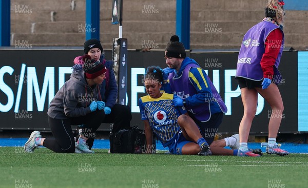271225 - Gwalia Lightning v Brython Thunder, Celtic Challenge - Nia Fajeyisan of Gwalia Lightning is treated after being injured before leaving the pitch on a stretcher 