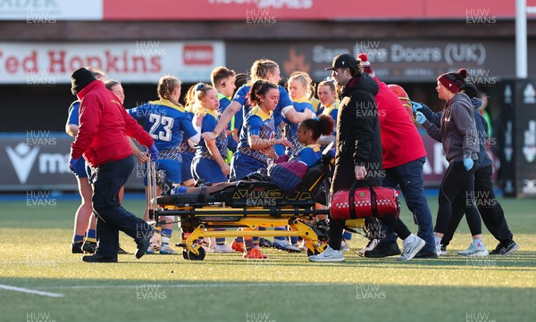 271225 - Gwalia Lightning v Brython Thunder, Celtic Challenge - Nia Fajeyisan of Gwalia Lightning is treated after being injured before leaving the pitch on a stretcher 