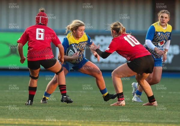 271225 - Gwalia Lightning v Brython Thunder, Celtic Challenge - Molly Reardon of Gwalia Lightning takes on Ffion Williams of Brython Thunder and Finley Jones of Brython Thunder