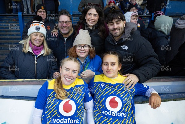 271225 - Gwalia Lightning v Brython Thunder, Celtic Challenge - Catherine Richards of Gwalia Lightning and Carys Hughes of Gwalia Lightning with family and friends at the end of the match
