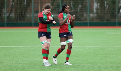140226 - Gwalia Lightning v Clovers, Celtic Challenge - Jemima Adams Verling of Clovers and Faith Oviawe of Clovers at the end of the match