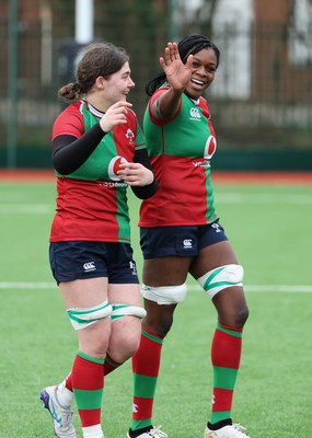 140226 - Gwalia Lightning v Clovers, Celtic Challenge - Jemima Adams Verling of Clovers and Faith Oviawe of Clovers at the end of the match