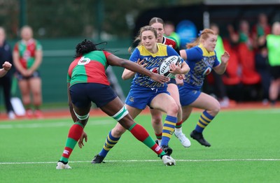 140226 - Gwalia Lightning v Clovers, Celtic Challenge - Caitlin Lewis of Gwalia Lightning takes on Faith Oviawe of Clovers