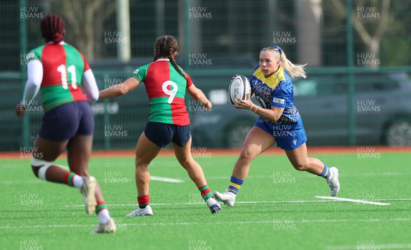 140226 - Gwalia Lightning v Clovers, Celtic Challenge - Kelsie Webster of Gwalia Lightning takes on Emily Lane of Clovers