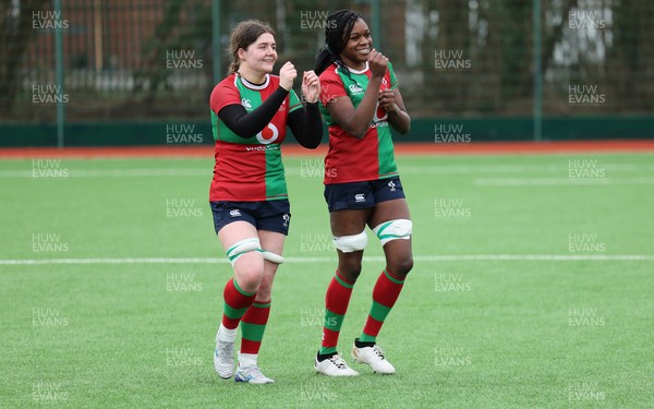 140226 - Gwalia Lightning v Clovers, Celtic Challenge - Jemima Adams Verling of Clovers and Faith Oviawe of Clovers at the end of the match