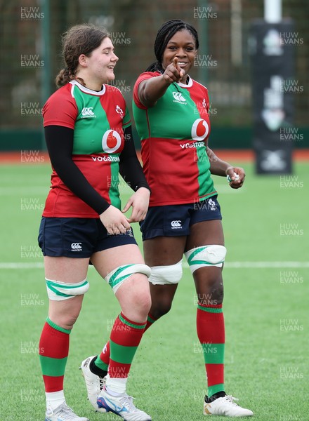 140226 - Gwalia Lightning v Clovers, Celtic Challenge - Jemima Adams Verling of Clovers and Faith Oviawe of Clovers at the end of the match