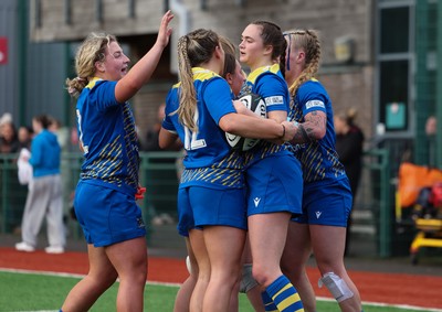 170126 - Gwalia Lightning v Edinburgh Rugby, Celtic Challenge - Caitlin Lewis of Gwalia Lightning celebrates with team mates after she dives in to score try