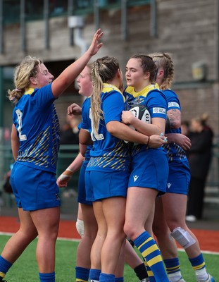 170126 - Gwalia Lightning v Edinburgh Rugby, Celtic Challenge - Caitlin Lewis of Gwalia Lightning celebrates with team mates after she dives in to score try