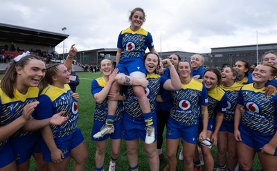 170126 - Gwalia Lightning v Edinburgh Rugby, Celtic Challenge - Lily Hawkins of Gwalia Lightning is held aloft by Jenny Hesketh of Gwalia Lightning and Maisie Davies of Gwalia Lightning at the end of the match