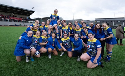 170126 - Gwalia Lightning v Edinburgh Rugby, Celtic Challenge - Lily Hawkins of Gwalia Lightning is held aloft during a team photograph at the end of the match