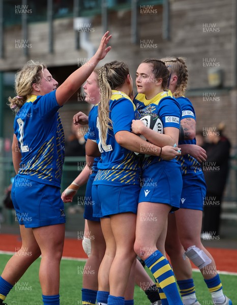 170126 - Gwalia Lightning v Edinburgh Rugby, Celtic Challenge - Caitlin Lewis of Gwalia Lightning celebrates with team mates after she dives in to score try