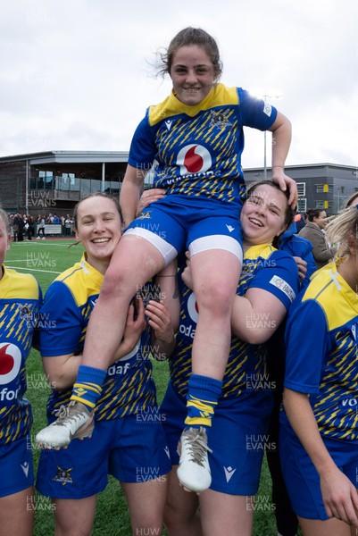 170126 - Gwalia Lightning v Edinburgh Rugby, Celtic Challenge - Lily Hawkins of Gwalia Lightning is held aloft by Jenny Hesketh of Gwalia Lightning and Maisie Davies of Gwalia Lightning at the end of the match