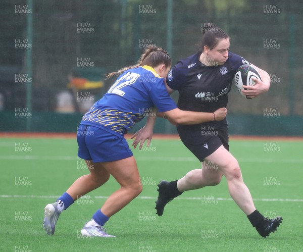 210226 - Gwalia Lightning v Glasgow - Celtic Challenge - Briar McNamara handing off Molly Anderson-Thomas