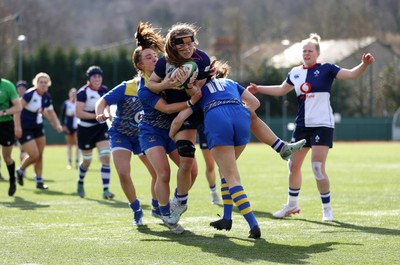 010325 - Gwalia Lightning v Wolfhounds - Celtic Challenge - Christy Haney of Wolfhounds is tackled by Caitlin Lewis of Gwalia Lightning 