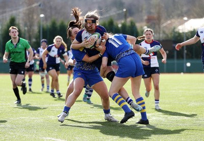 010325 - Gwalia Lightning v Wolfhounds - Celtic Challenge - Christy Haney of Wolfhounds is tackled by Caitlin Lewis of Gwalia Lightning 