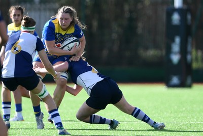 280226 - Gwalia Lightning v Wolfhounds - Celtic Challenge - Alaw Prys of Gwalia Lightning is challenged by Maebh Clenaghan of Wolfhounds