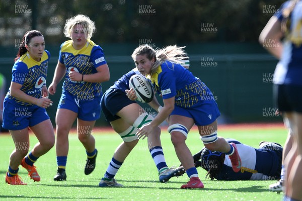 280226 - Gwalia Lightning v Wolfhounds - Celtic Challenge - Anwen Owen of Gwalia Lightning is challenged by Sophie Barrett of Wolfhounds