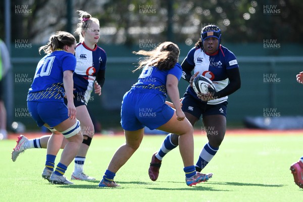 280226 - Gwalia Lightning v Wolfhounds - Celtic Challenge - Linda Djougang of Wolfhounds is challenged by Gwennan Hopkins of Gwalia Lightning