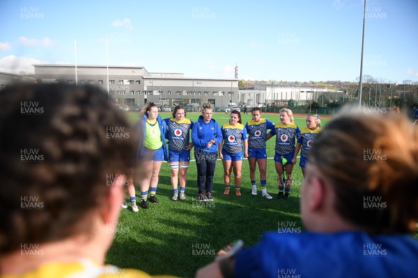 280226 - Gwalia Lightning v Wolfhounds - Celtic Challenge - Gwalia team huddle at full time