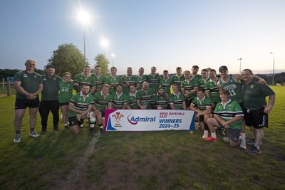 300425 - Gwernyfed RFC League Trophy Presentation - Admiral National League 4 West B - Gwernyfed RFC Captain Sam Stevens celebrates lifting the trophy with his team