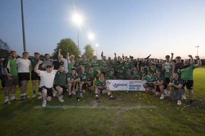 300425 - Gwernyfed RFC League Trophy Presentation - Admiral National League 4 West B - Gwernyfed RFC Captain Sam Stevens celebrates lifting the trophy with his team