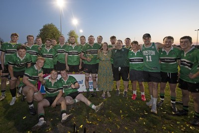 300425 - Gwernyfed RFC League Trophy Presentation - Admiral National League 4 West B - Gwernyfed RFC Captain Sam Stevens celebrates lifting the trophy with his team