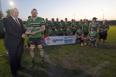 300425 - Gwernyfed RFC League Trophy Presentation - Admiral National League 4 West B - WRU Rep Roy Wilkinson presents the trophy to Gwernyfed RFC Captain Sam Stevens 